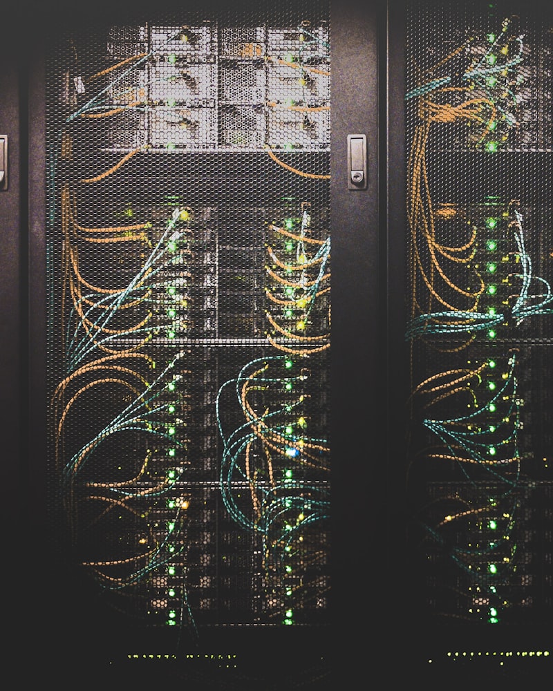 Server racks with network cabling in a data center